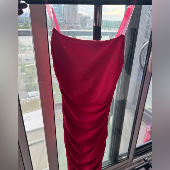 A mini bodycon dress from oh Polly in a US size 2. Fits like a glove. - Picture 2 of 3